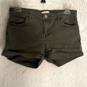 Cute army color green shorts. No rips or tears. Perfect for the warm weather